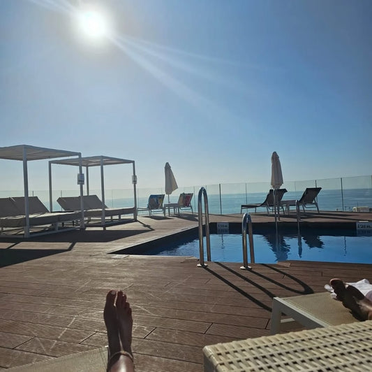 white nail polish pedicure swatch, on deck chair on holiday